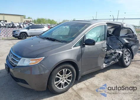 2011 Honda Odyssey Ex-L z USA, uszkodzony, nr VIN 5FNRL5H66BB038907